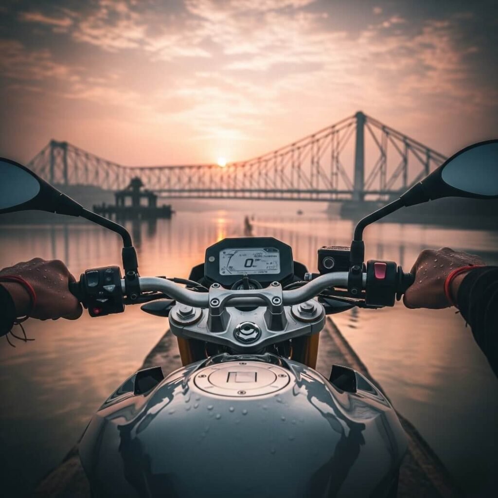 Howrah Bridge sunrise: motorcycle handlebars, sweaty hands.
